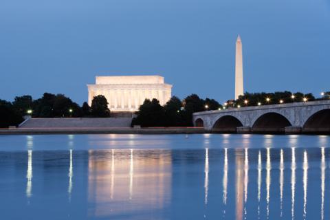 Monuments and Potomac River at night