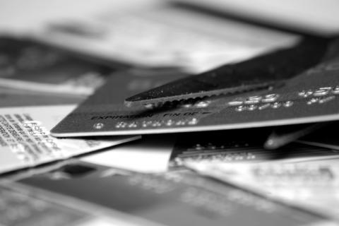 scissors cutting a credit card