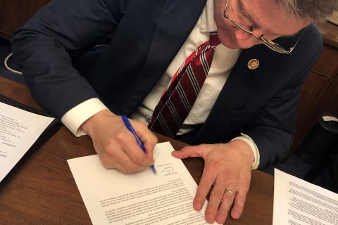 Congressman Burchett signing President disaster relief FEMA letter